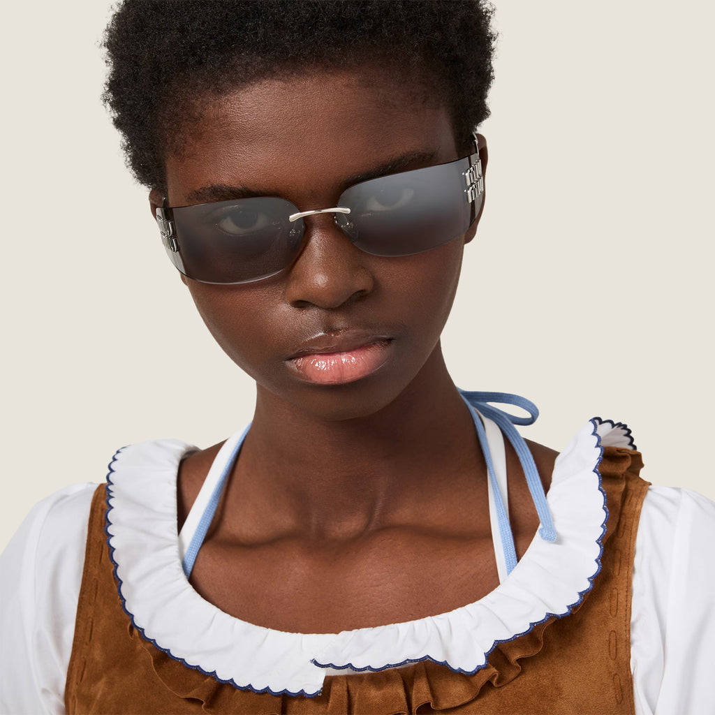 Lunettes de soleil MIU MIU MUZS argentées