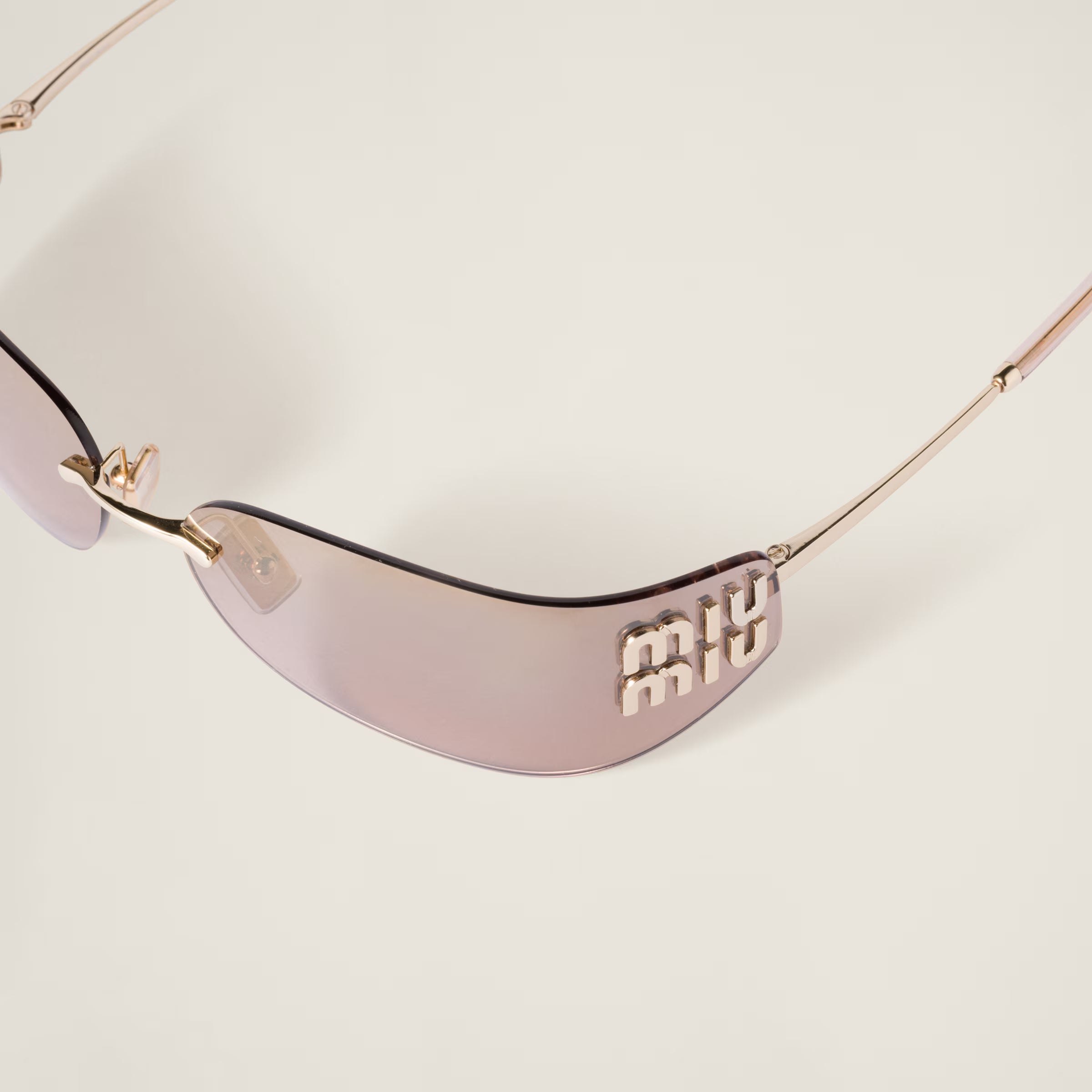 Lunettes de soleil MIU MIU MUZS Or