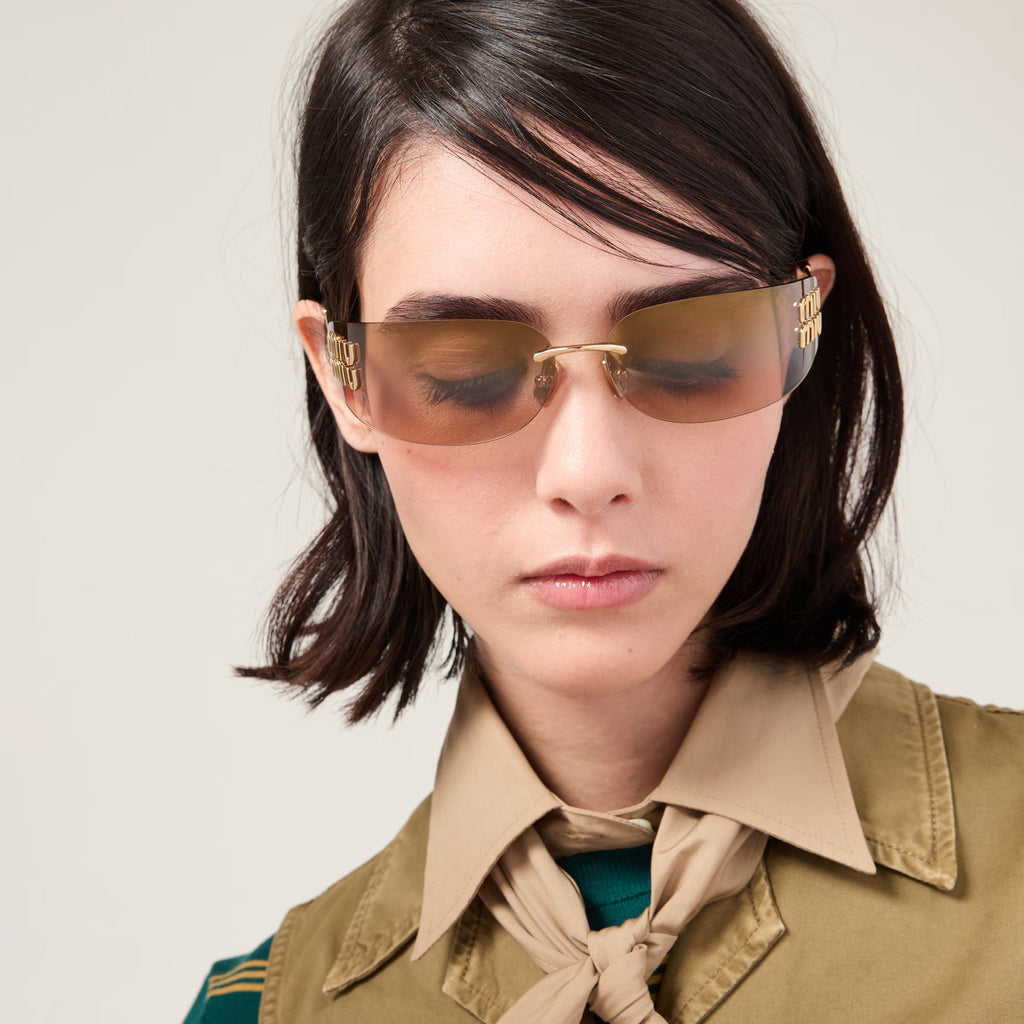 Lunettes de soleil MIU MIU MUZS Or