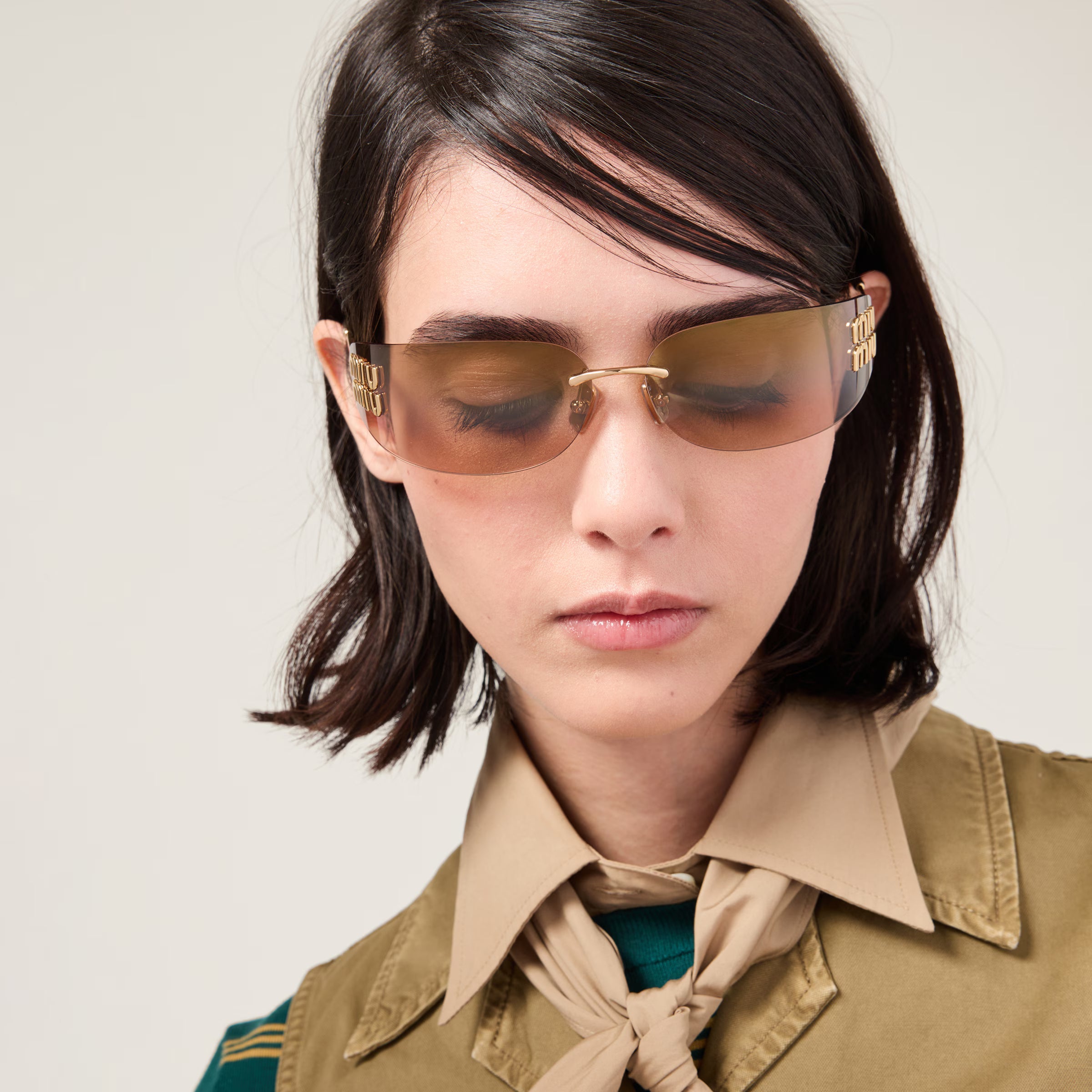 Lunettes de soleil MIU MIU MUZS Or