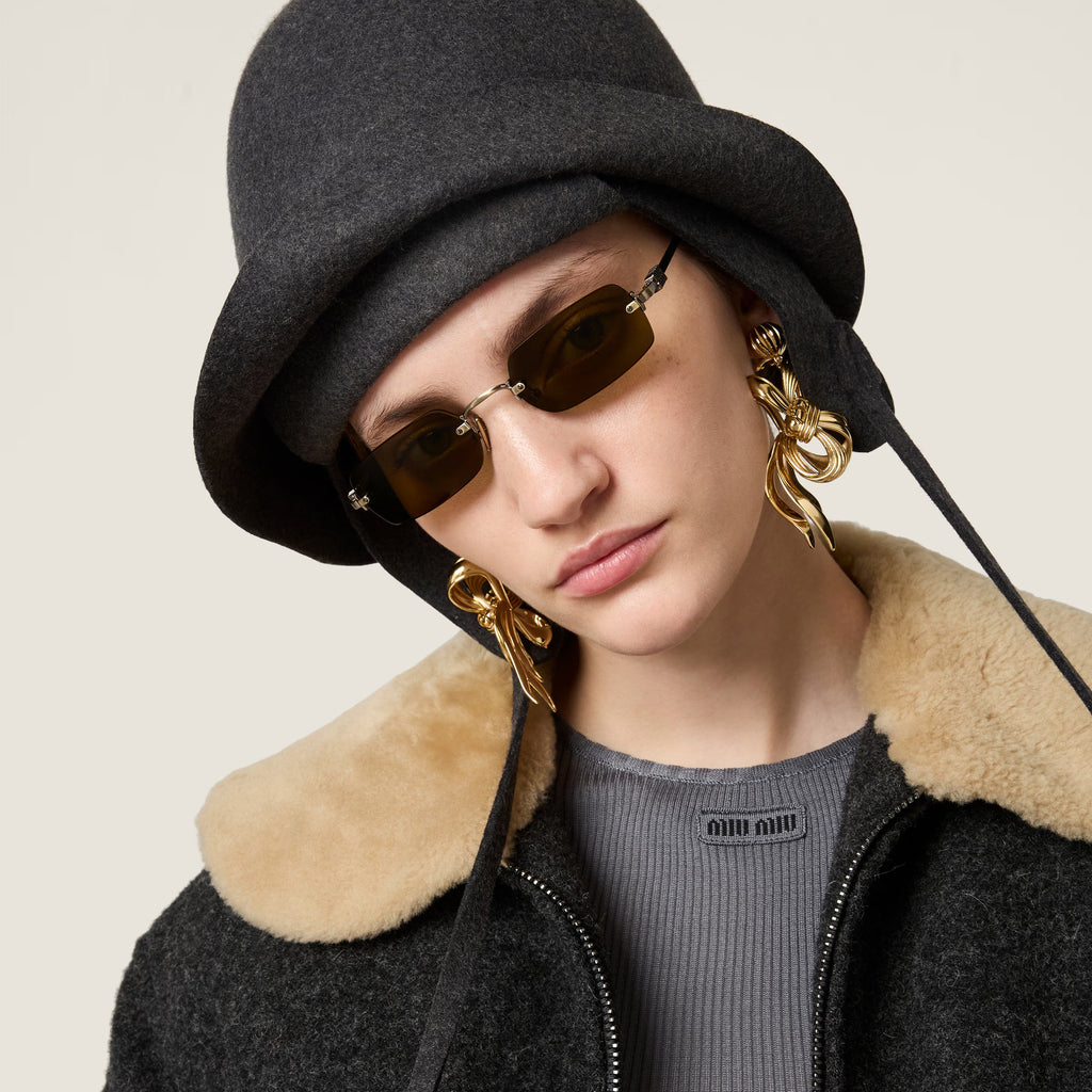 Lunettes de soleil Miu Miu 56ZS Eyewear